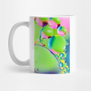 Colorful close up of oil drops in water Mug